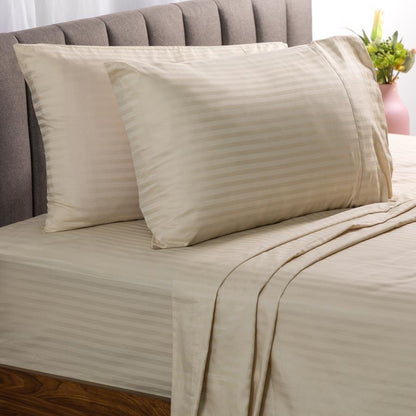 Royal Deluxe Breathable Beige Cotton Dream Sheet Set on a bed