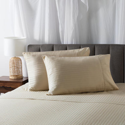 Two pillows on a bed with Beige Breathable Cotton Sheets