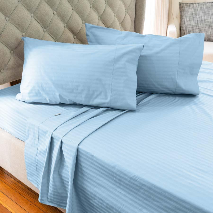 Light Blue Cotton Sheets on a bed