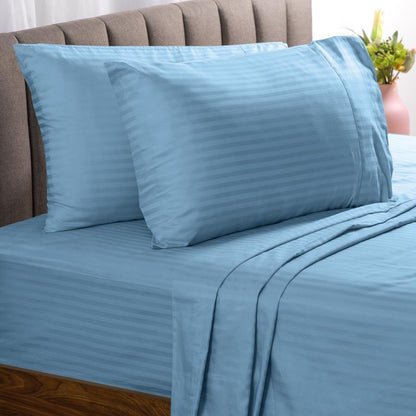 Light Blue Cotton Sheets on a bed