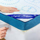Person placing a Straight2Sleep Topper on a bed. 